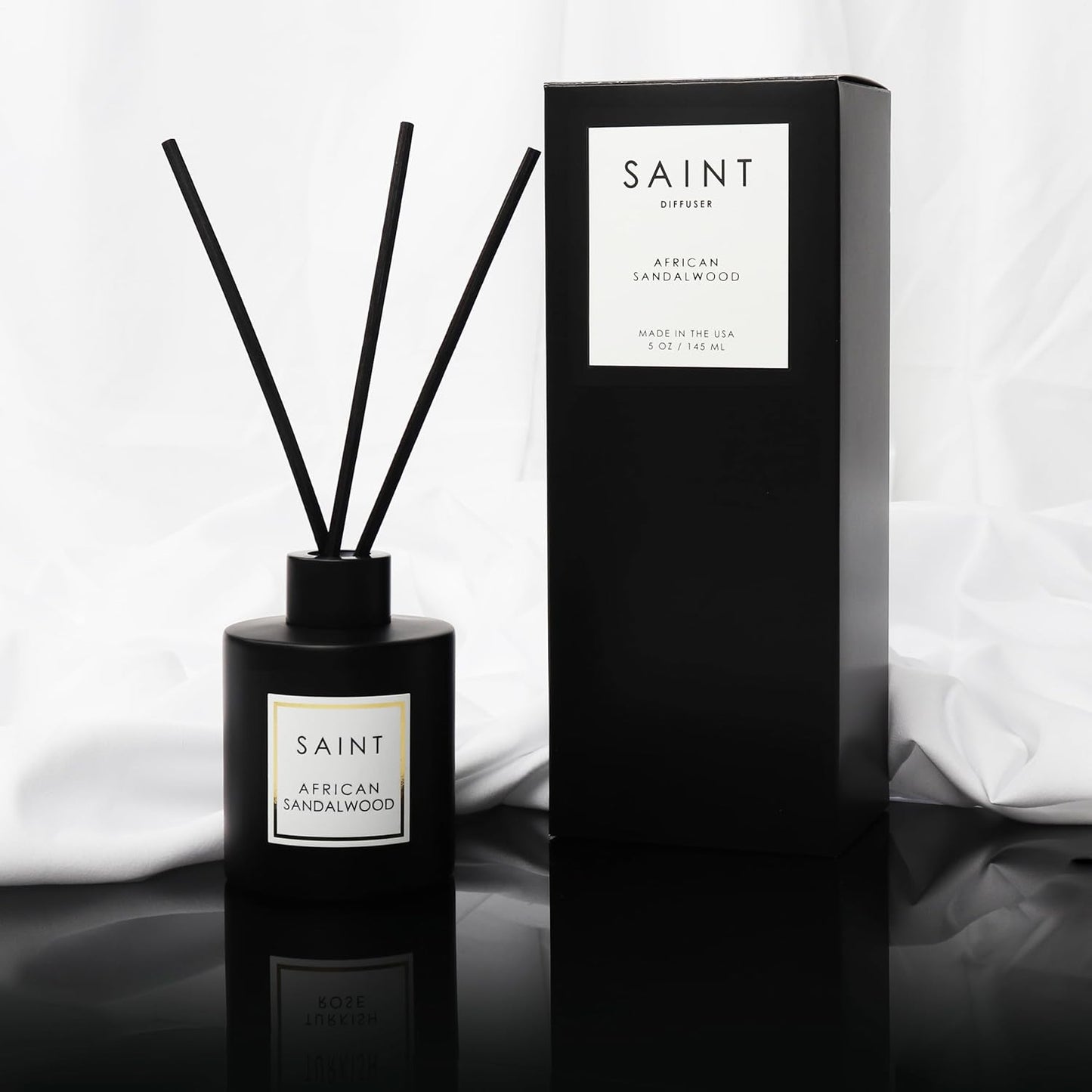 SAINT Reed Diffuser, Aromatherapy Diffuser Set with Scent Diffuser Sticks, Long-Lasting Oil Diffuser in Matte Black Glass Jar, Aroma Diffuser for Home, Bedroom, or Bathroom, 5oz, African Sandalwood