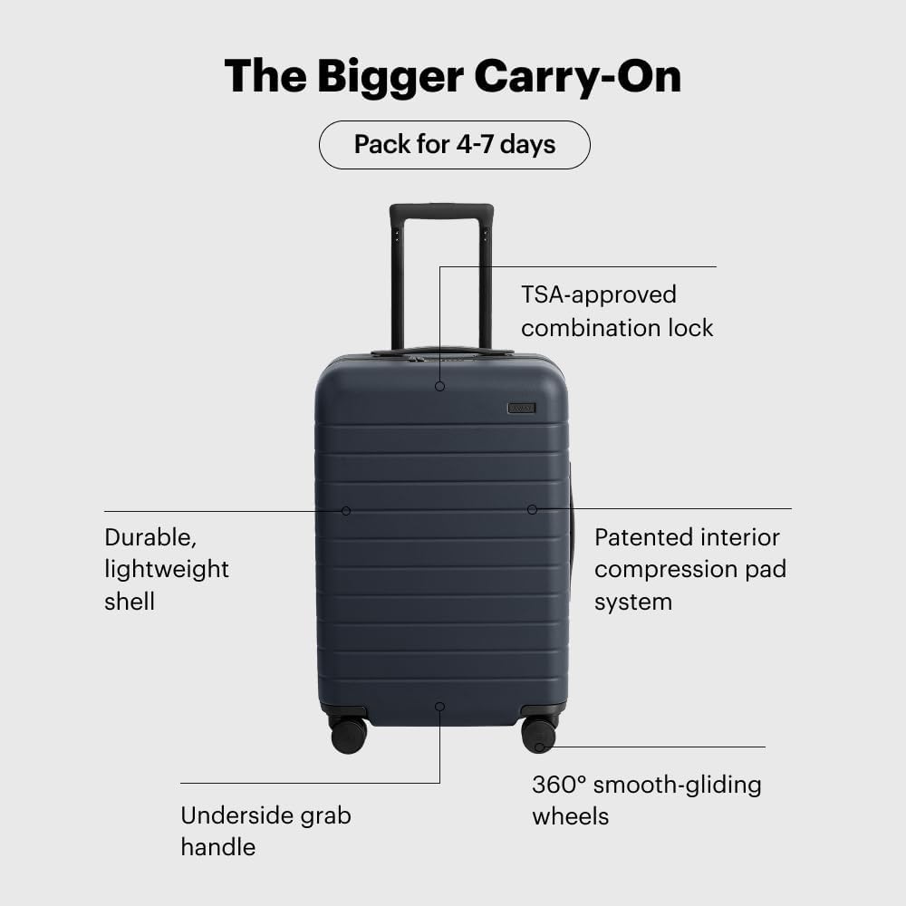 Away Bigger Carry-On Luggage, Lightweight Hardside Large Suitcase with Spinner Wheels, TSA Lock, Airline Approved, Navy Blue