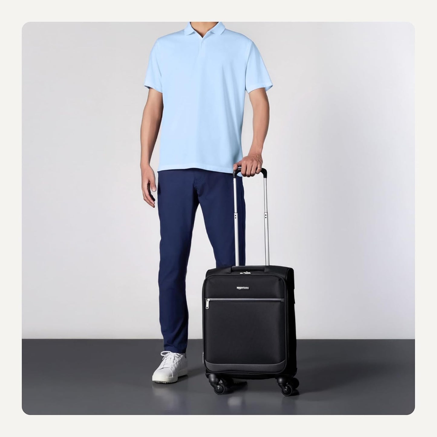 Amazon Basics Luggage, 18" Medium Carry-On Softside Suitcase With Wheels, With Four 360-Degree Multi-directional Spinner Wheels, Expandable Space, ZipperedPocket and Straps, Telescopic Handle, Black