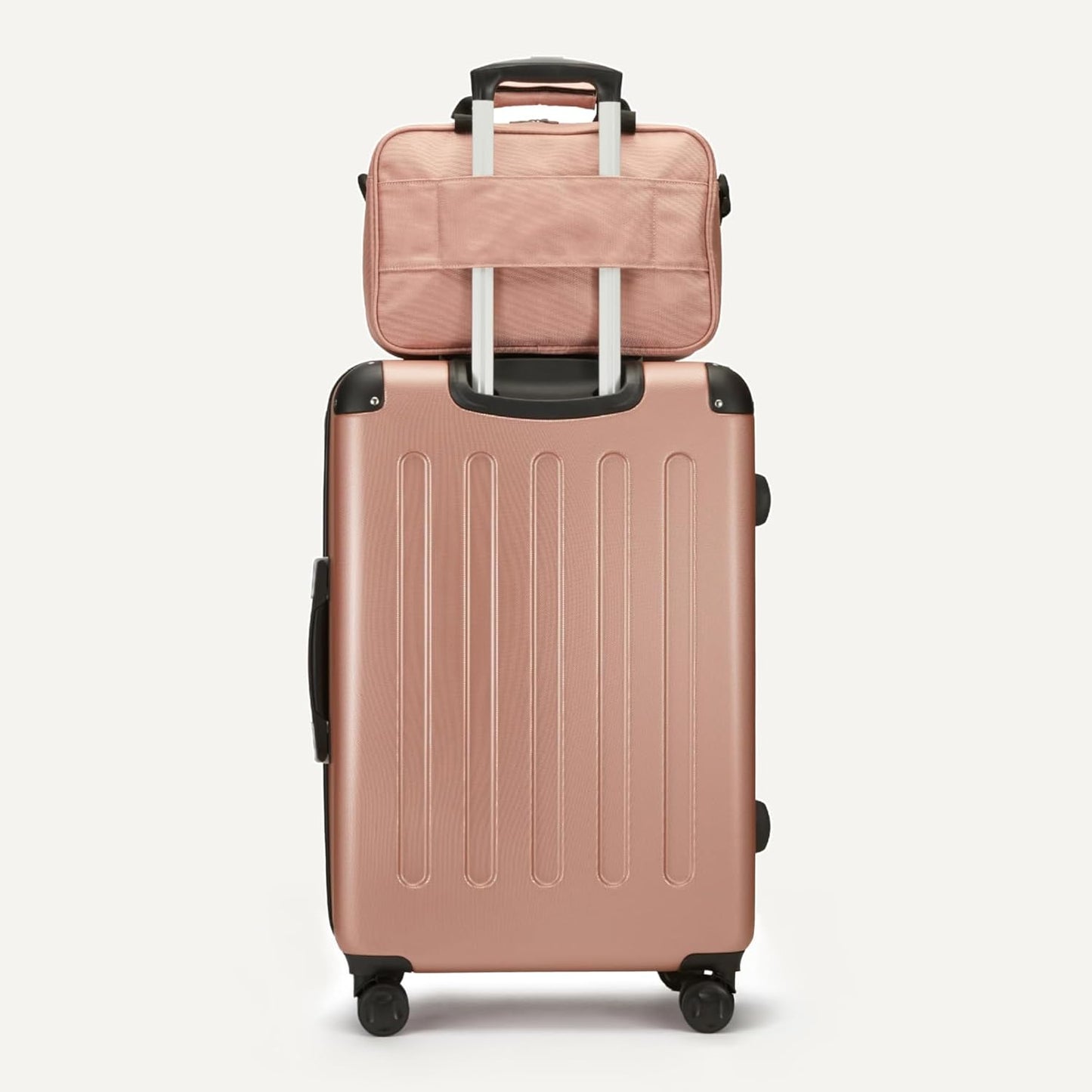 Amazon Basics 4-Piece Luggage Set, Including Two Hardside Suitcases With Multidirectional Spinner Wheels (22" CarryOn and 28" Checked), Plus 15-inch Tote Bag and 10-inch Compact Travel Bag, Rose Gold
