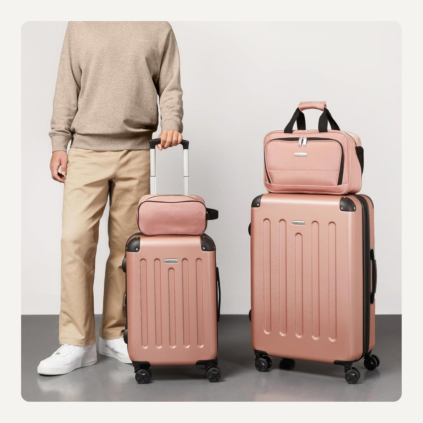 Amazon Basics 4-Piece Luggage Set, Including Two Hardside Suitcases With Multidirectional Spinner Wheels (22" CarryOn and 28" Checked), Plus 15-inch Tote Bag and 10-inch Compact Travel Bag, Rose Gold