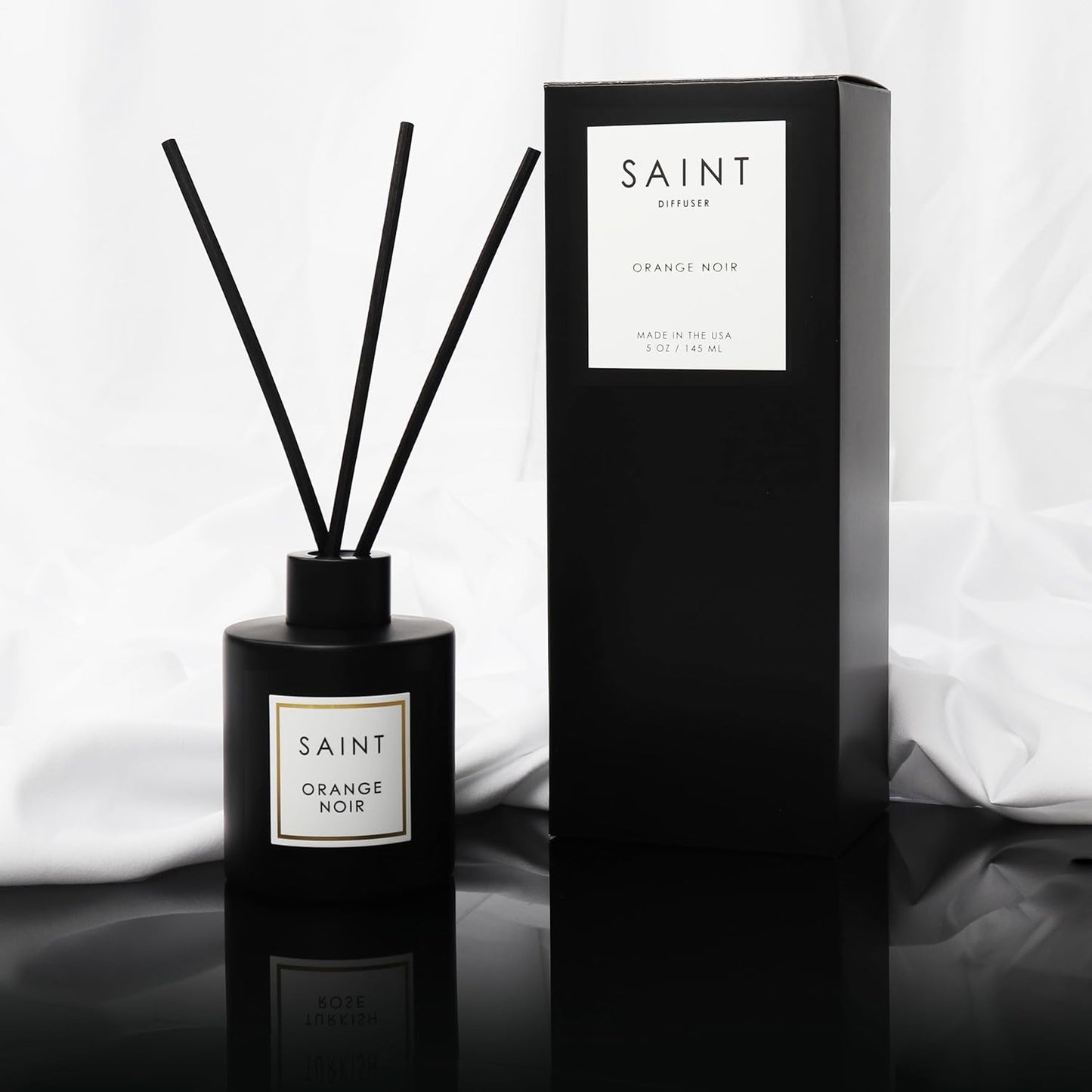 SAINT Reed Diffuser, Aromatherapy Diffuser Set with Scent Diffuser Sticks, Long-Lasting Oil Diffuser in Matte Black Glass Jar, Aroma Diffuser for Home, Bedroom, or Bathroom, 5oz, Orange Noir