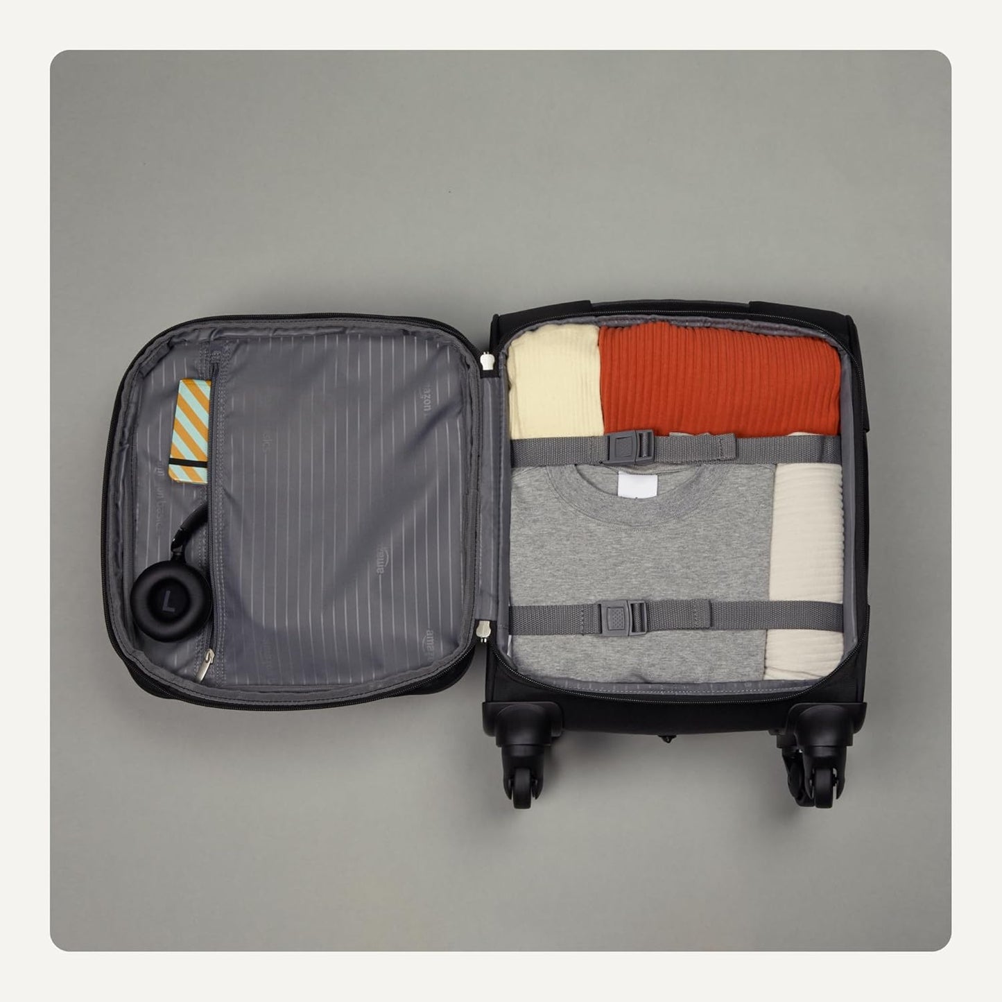 Amazon Basics Luggage, 15" Small Carry-On Softside Suitcase With Wheels, With Four 360-Degree Multi-directional Spinner Wheels, Expandable Space, Zippered Pocket and Straps, Telescopic Handle, Black